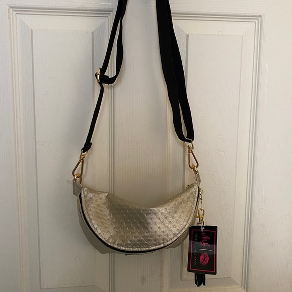 Makeup Junkie Handbags - Makeup Junkie Sidekick over the should bag Brand new with Tag
